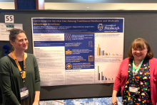 Drs. Ellison and Quinn in front of post at Society of Family Planning annual meeting